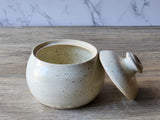 Handmade ceramic sugar bowl with cream speckled interior