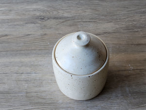 Small handmade pottery jar for sugar or honey