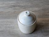 Small handmade pottery jar for sugar or honey