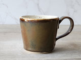 Wheel-thrown pottery espresso cup bronze and brown