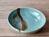 Handmade pottery soup bowl with brown glaze accent