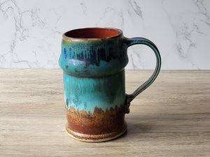 Rustic ceramic mug with mottled glaze finish