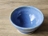 Small handmade stoneware bowl for kitchen or bedside use