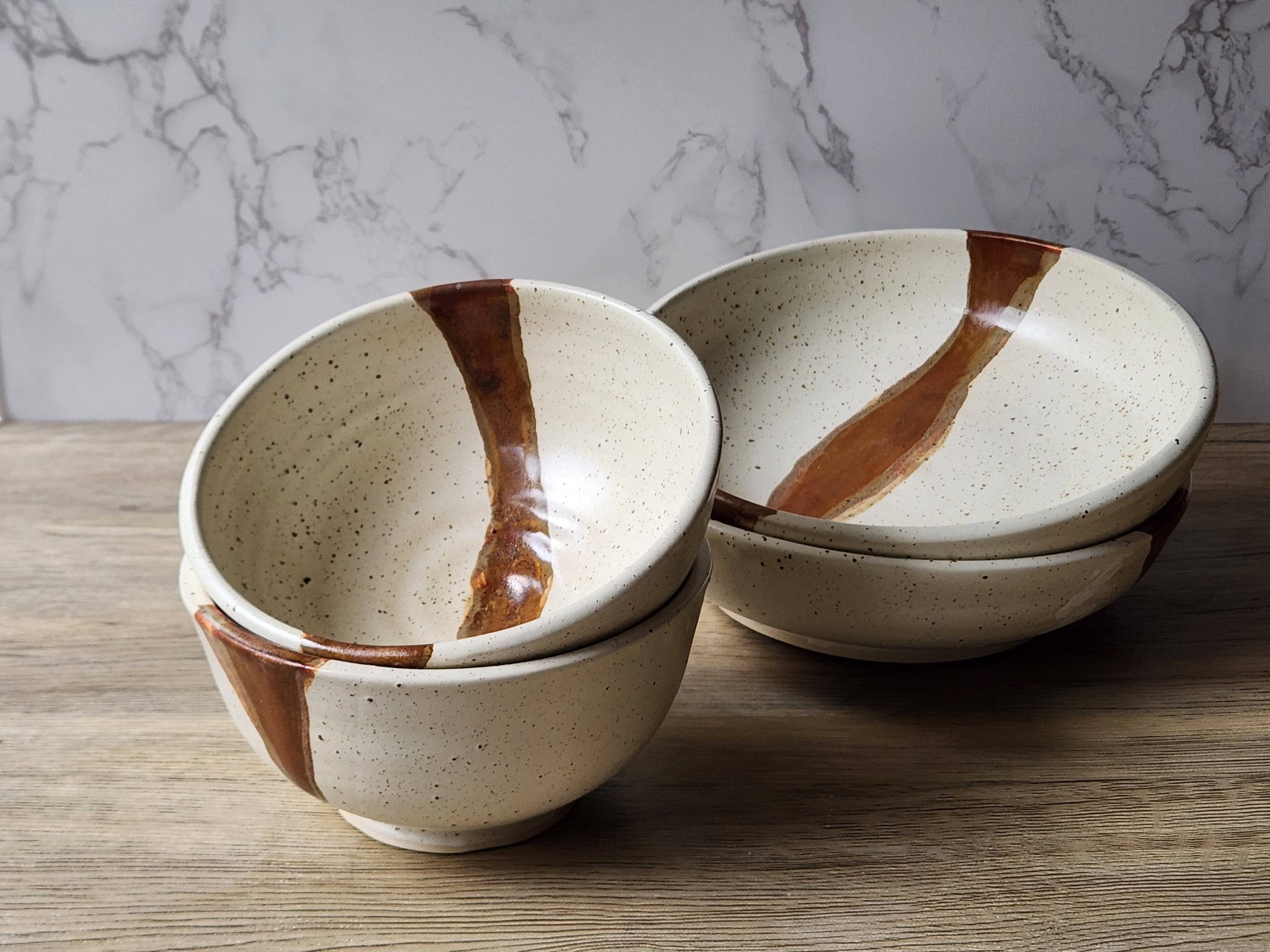 Rustic ceramic soup bowl with brown slash accent
