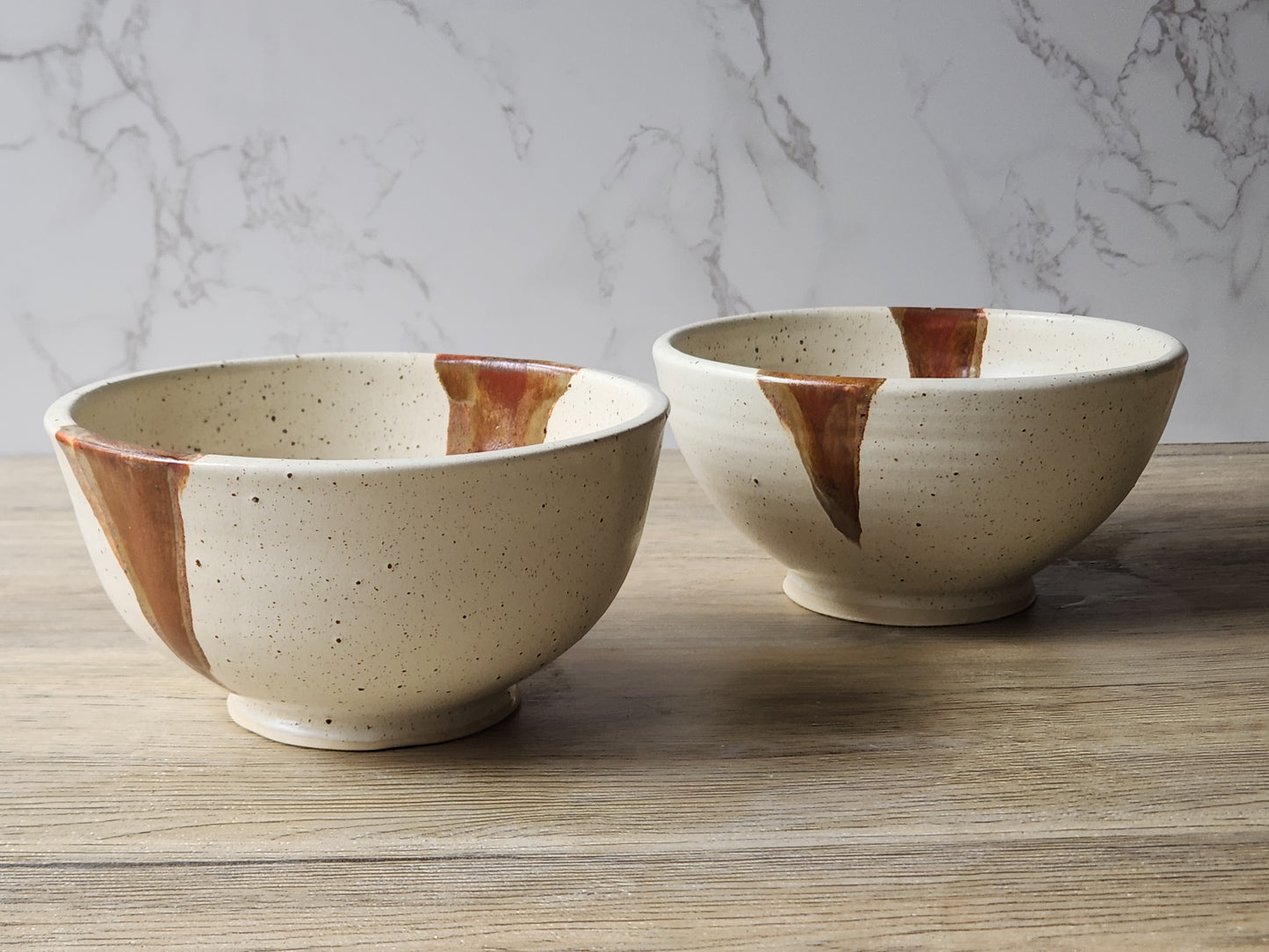 Artisan pottery noodle bowl in rustic cream and brown glaze