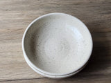Rustic pottery pasta bowl with natural earthy finish
