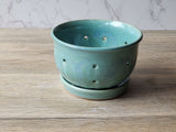Rustic stoneware berry colander with matching drip tray