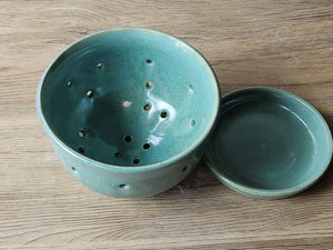 Unique handmade berry bowl in mottled glaze with saucer