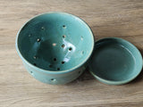 Unique handmade berry bowl in mottled glaze with saucer
