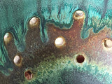 Close up of Handmade pottery berry bowl, ideal for rinsing fruit