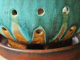 Close up of glaze on the Ceramic berry colander with matching drip saucer, artisan crafted