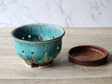 Rustic handmade berry bowl in mottled earthy glaze tones