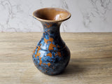 Unique ceramic vase with natural crystal growths