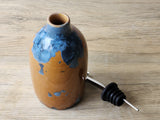 Orange and blue crystalline glaze ceramic oil bottle