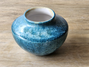 Handmade pottery vase with crystal details