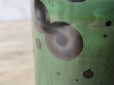 Close up of crystal formation on Unique green ceramic art vase made in Australia