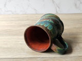 Australian handmade pottery mug – layered green and amber glaze
