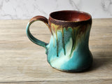 Side profile of handmade 400ml mug with drip glaze effect