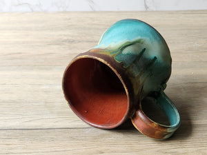 One-of-a-kind green and rust red handmade pottery coffee mug