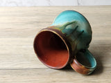 One-of-a-kind green and rust red handmade pottery coffee mug