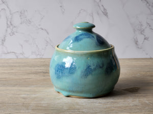 Handmade ceramic sugar bowl with lid in green and blue glaze