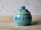 Handmade ceramic sugar bowl with lid in green and blue glaze