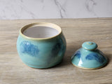 Handmade Small pottery jar with speckled green glaze and lid - made in our Melbourne studio.