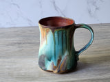 Side view of handmade stoneware coffee mug