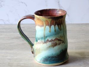 Drip-glazed artisan mug with ergonomic handle
