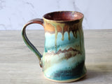 Drip-glazed artisan mug with ergonomic handle