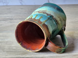 Handmade Mug with fluid glaze layers in natural tones from our Melbourne studio.