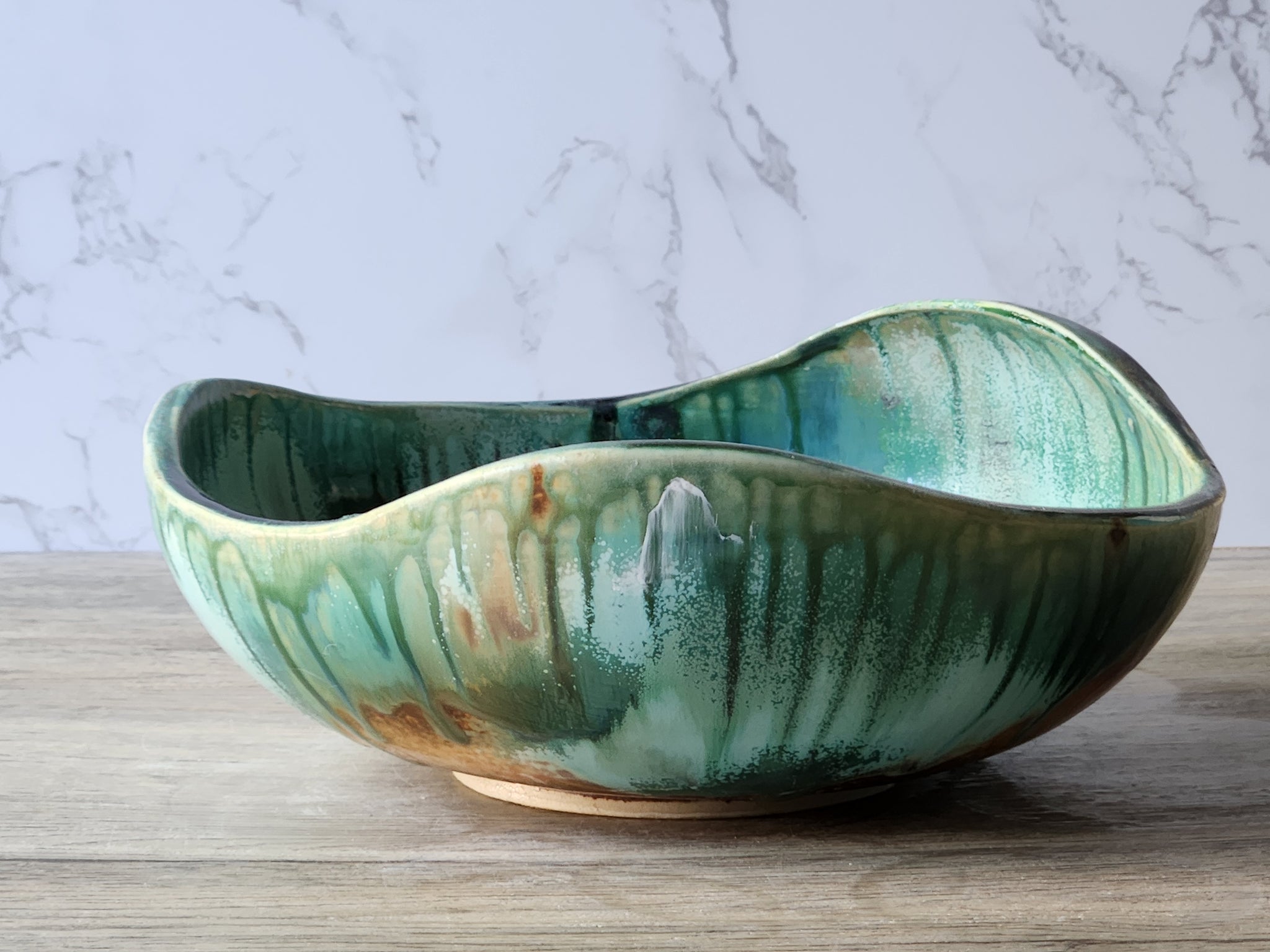Large stoneware serving bowl with flowing organic shape