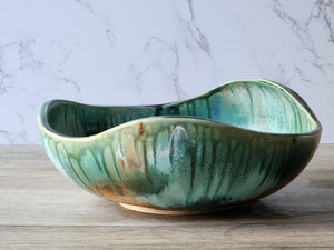 Large stoneware serving bowl with flowing organic shape