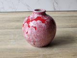 Crystalline vase with red glaze and floating crystals
