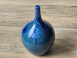 Handmade porcelain bud vase with blue crystals