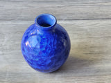 Artisan porcelain bud vase in vibrant sapphire blue glaze