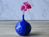 Artisan porcelain bud vase in vibrant sapphire blue glaze