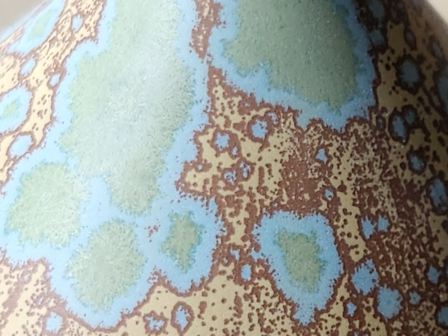 close up of Matte finish ceramic vase with crystal pattern