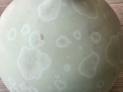 Close up crystalline glaze detail on mint pottery vase