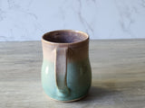 Back view of handmade ceramic mug showing handle detail, Australian handmade pottery