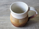 Large handmade ceramic coffee mug with earthy layered glaze, Australian stoneware pottery