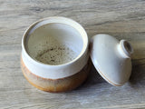 Handmade ceramic sugar bowl with lid beside bowl, Buxton Pottery Australian pottery
