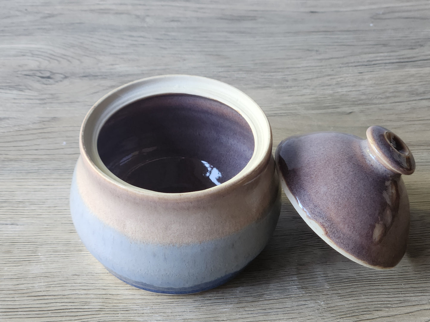 Top view of handmade ceramic sugar bowl showing glazed interior