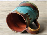 “Handmade ceramic mug interior with warm brown glaze, food safe stoneware”