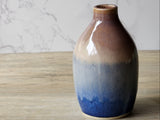 Handmade pottery bud vase with oatmeal to deep blue glaze gradient, ceramics made in Melbourne Australia