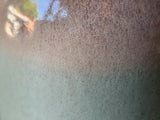 Macro detail of oatmeal and seafoam glaze on handmade ceramic vase, handmade pottery Melbourne Australia
