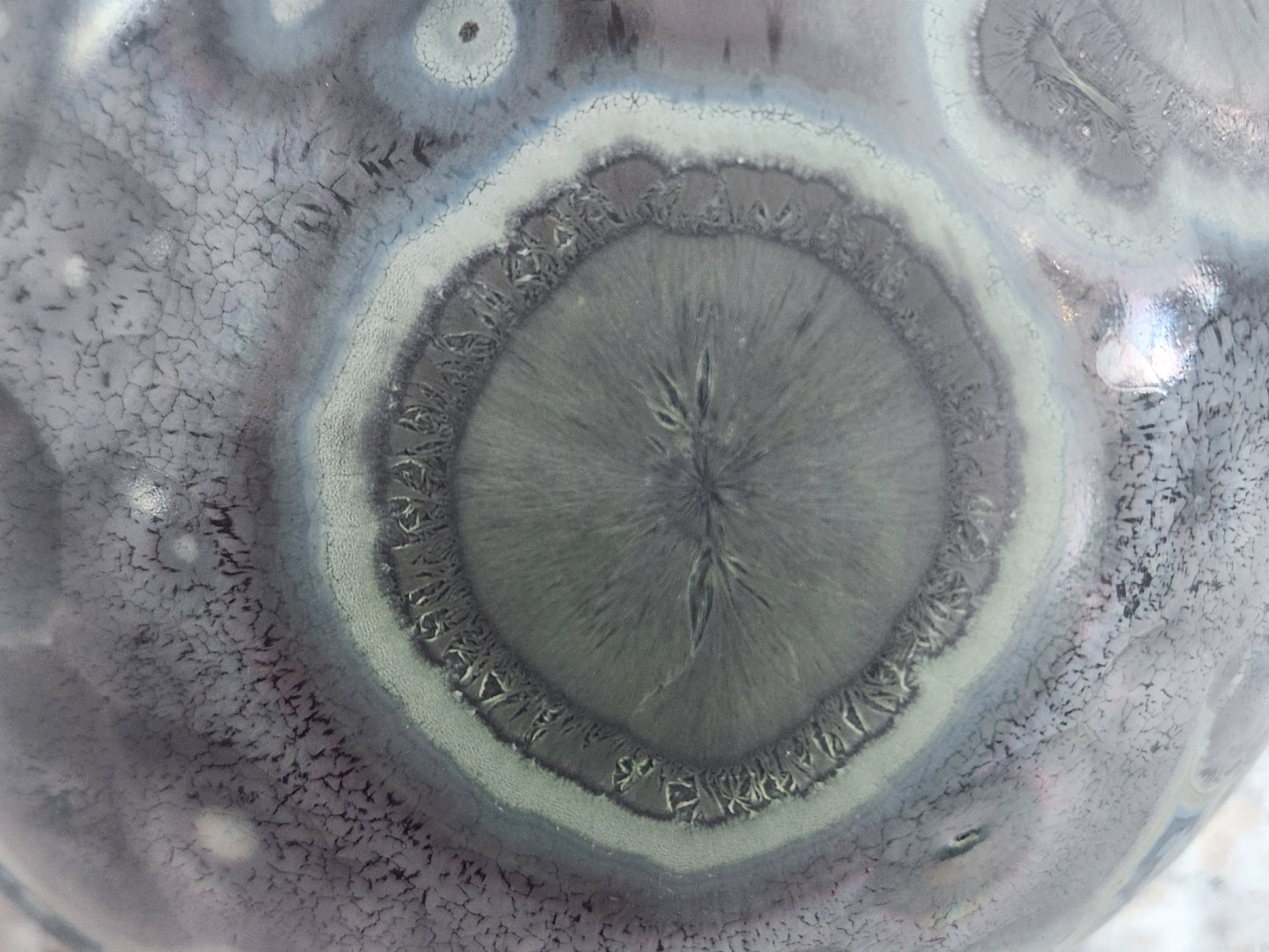Close up of galaxy glaze speckling and crystal movement on one-of-a-kind Melbourne handmade pottery vase