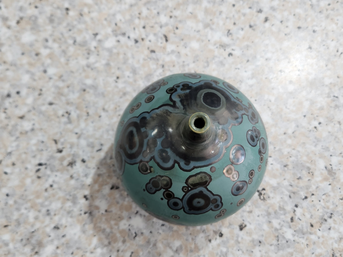 Top view of small bud vase opening with galaxy crystalline glaze handmade ceramics