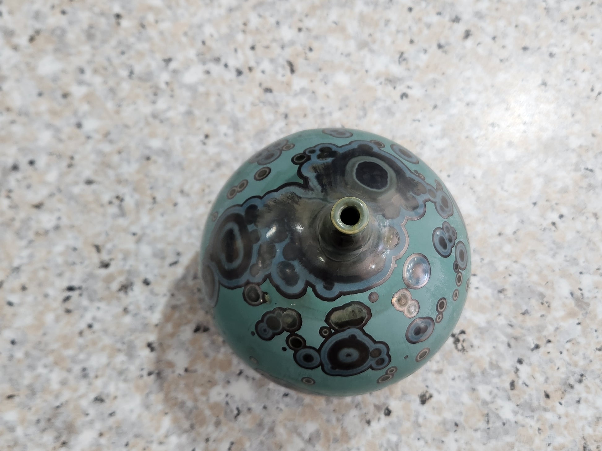 Top view of small bud vase opening with galaxy crystalline glaze handmade ceramics