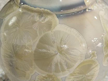 Golden crystals shown in close up of a large crystalline vase made n Melbourne.
